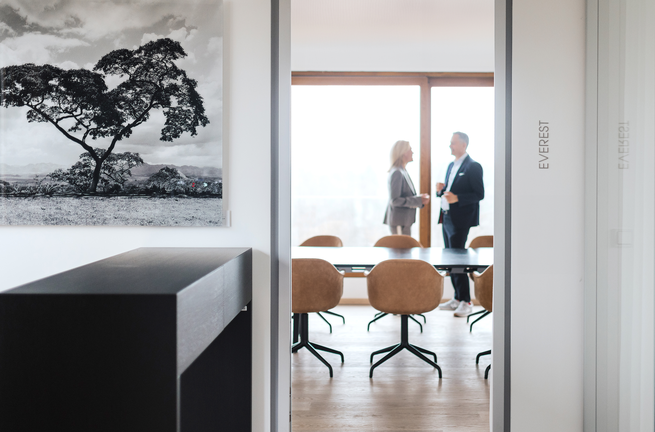 DJE employees in conversation